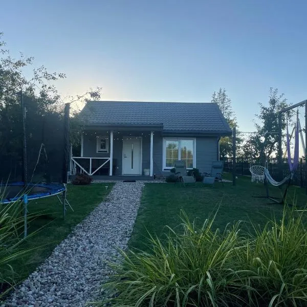 Cozy holiday house with sauna and entertainment, hotel v destinaci Puskelniai