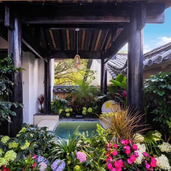 Yunman Sky Cloud Quiet Garden Guesthouse offers breakfast and afternoon tea with free airport shuttle servicesThe hotel provides paid car service ticket services for attractions features billiards room KTV tea room saunas laundry facilities café meeting, hotel i Lijiang