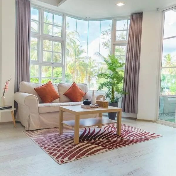 Cozy 1BR apartment by beach - partial ocean view, hotel v destinaci Hulhumale