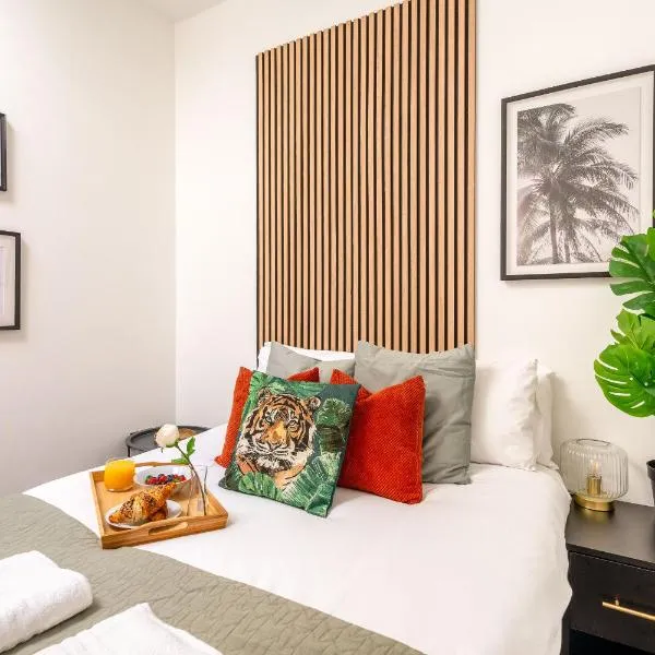 Cozy Kingfisher - 2-Bed Bungalow in Brighton near the Beach With Free WiFi & Terrace by Kozmo Properties, hotel v destinaci Brighton & Hove