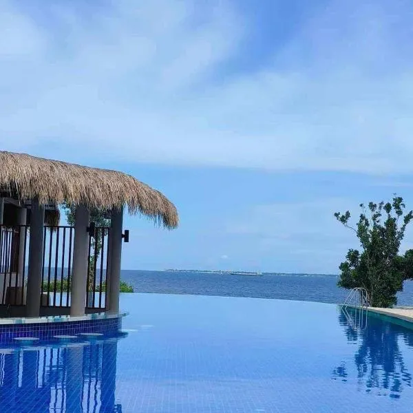 Budget friendly 1bedroom in The Mactan Newtown with pool&beach access, hotel v destinaci Punta Engaño