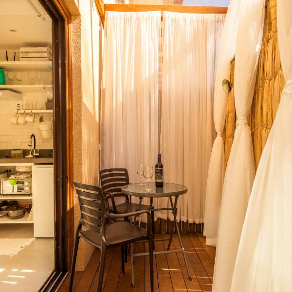 Casa d'Aroeira Residencial Boutique - Centro de Juqueí - Perto de Tudo - 2 quadras do Mar - Serviço de Praia - Roupa de Cama 600 fios algodão Egípcio - Tudo Novo - Estacionamento Interno - Cozinha - Consulte unidades com Ofurô Hidro e Cromoterapia - Foto 5