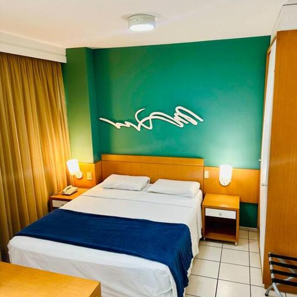 Praia do Canto Apart Hotel - Quarto sala e varanda - Foto 2