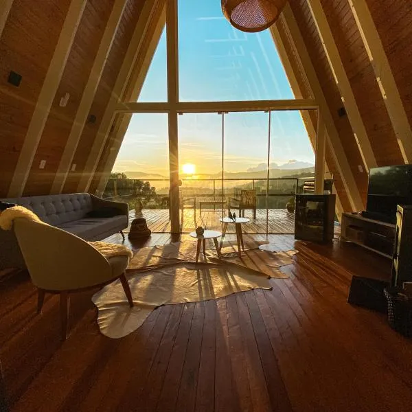 Casa Di Legno Cabana incrível com vista para as montanhas, hotel in Urubici