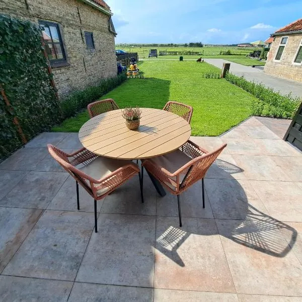 Muziekskuur, hotel u gradu 'Hollum'