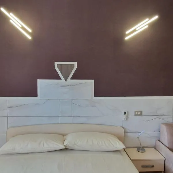 Aria e sole, hotel Cauloniában