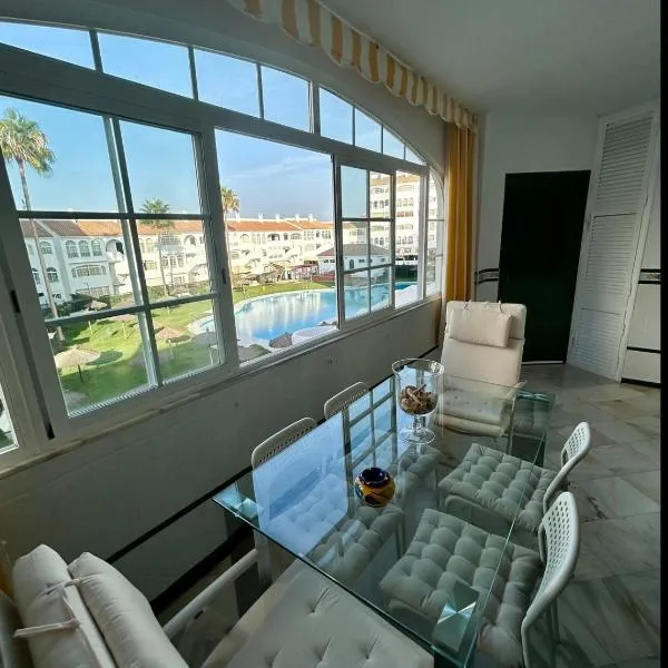 Apto Laguna con piscina, hotel in El Portil