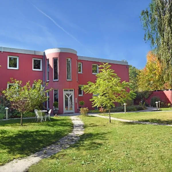 Residence Moai - Exklusiver Rückzugsort für Geschäftsreisen - kostenloser Parkplatz, WLAN, Waschtrockner, Smart TV, Qbo ESSENTIAL, ergonomischer Schreibtisch, hotel in Erlangen