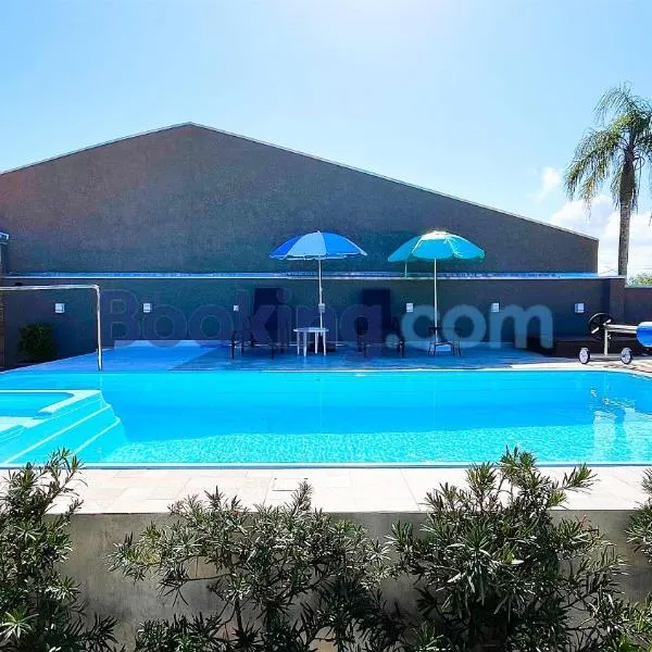 Casa Sol da Manhã - Piscina aquecida com hidromassagem - 300m da praia, hotel in Guaratuba