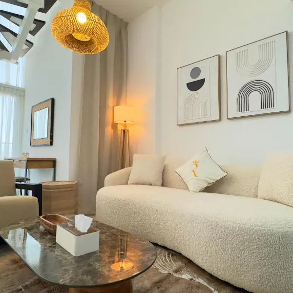 Oasis Grove Stylish 2BR Retreat - Modern Stay in Masdar City Near Masdar Park, hotel in Abu Dhabi