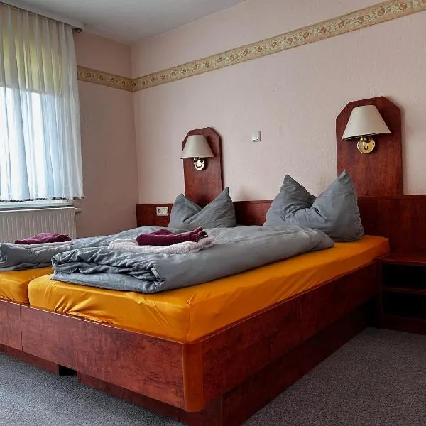 Pension FAULPELZ - Doppelzimmer mit Bad, hotel v destinaci Niederorschel
