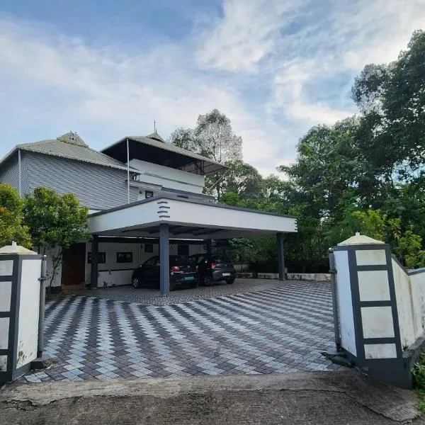 EBs Guest House, hotel v destinaci Nedumbassery