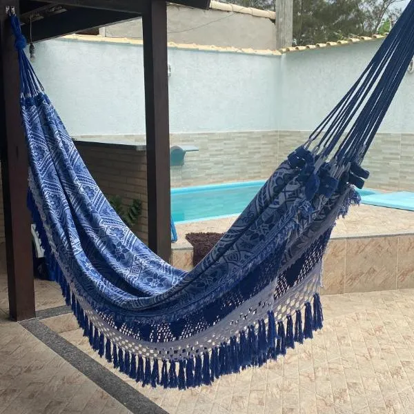 Casa com piscina- condomínio terra mar UNAMAR CABO FRIO, hotel in Tamoios