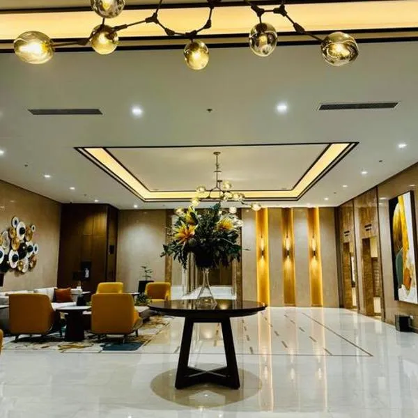 10G Cozy Condo at Park McKinley West near Venice Mall, hotel en Manila