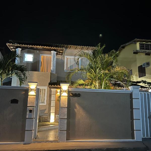 Casa com piscina, churrasqueira e ar condicionado em condomínio