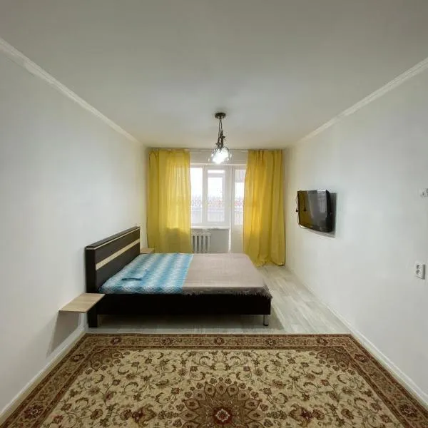 Уютные апартаменты в 11 микрорайоне, hotel in Aktobe