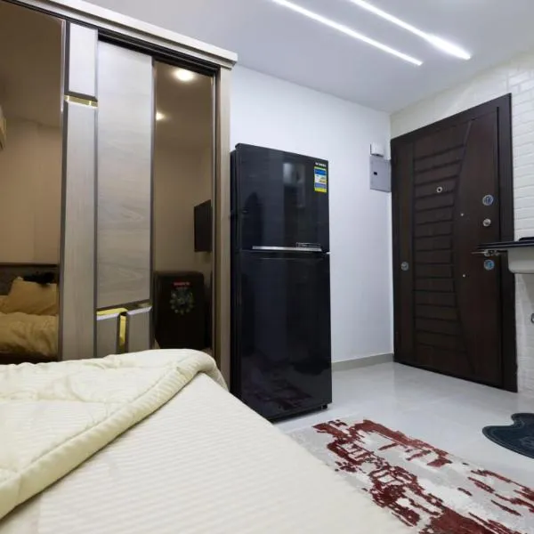 Marfida - غرف بحمامات خاصة قرب MSA وميدان الحصري, hotel in 6th Of October