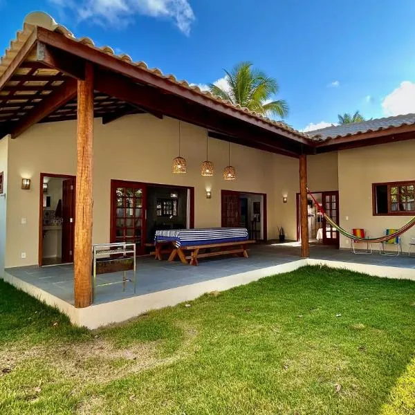 Casa Morena Luz na Vila de Cumuru, pra fazer tudo a pé! 350m da Praia do Pier!, hotel in Cumuruxatiba