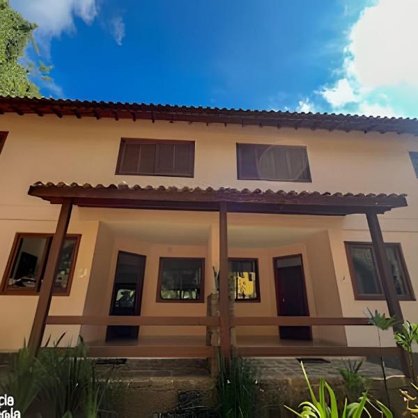 Linda casa em condomínio perto da praia