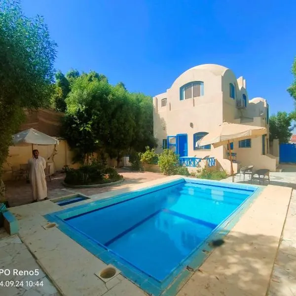 Touha House, hotel Fajjúmban