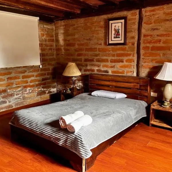 Cabaña en el Campo Malchinguí WIFI 24 horas, hotel v destinaci Malchinguí