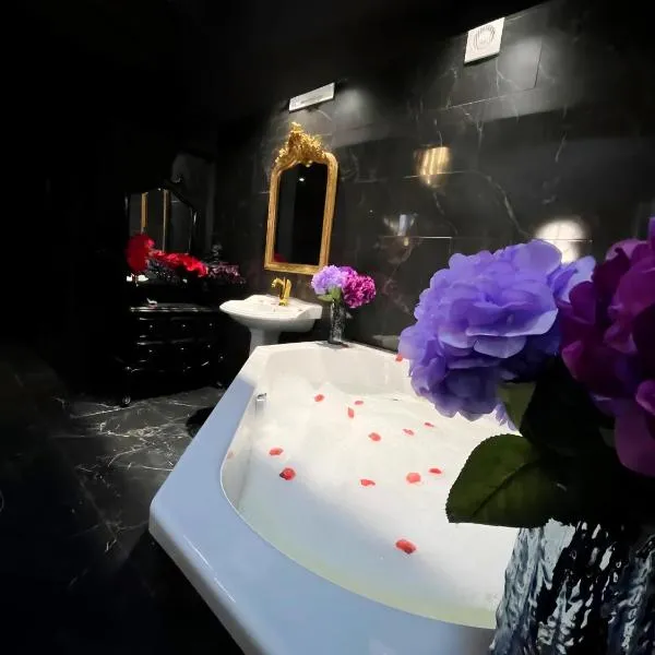 Flagy में, होटल L'Orchidarium, maison élégante et romantique à Flagy - Loveroom en duplex
