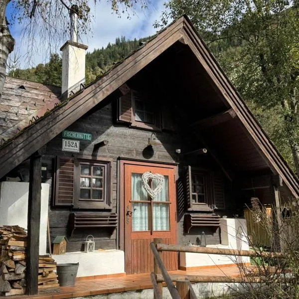 Ferienhaus Fischerhütte Rassis Feriendorf Donnersbachwald, hotel in Donnersbachwald