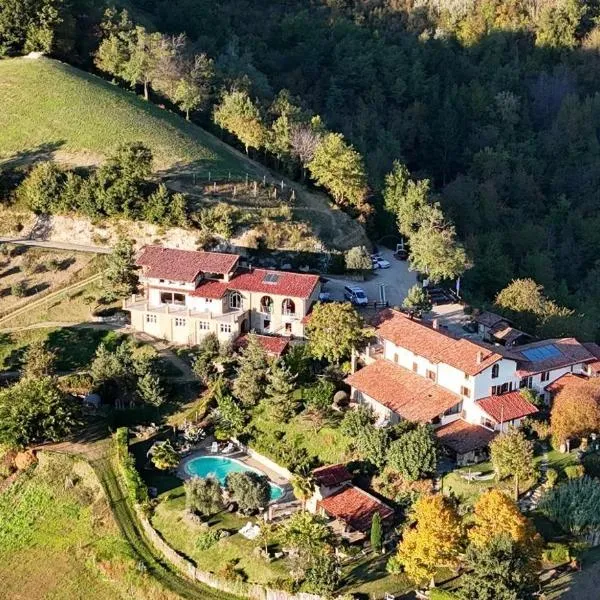 Agriturismo Sondrea, מלון בSinio
