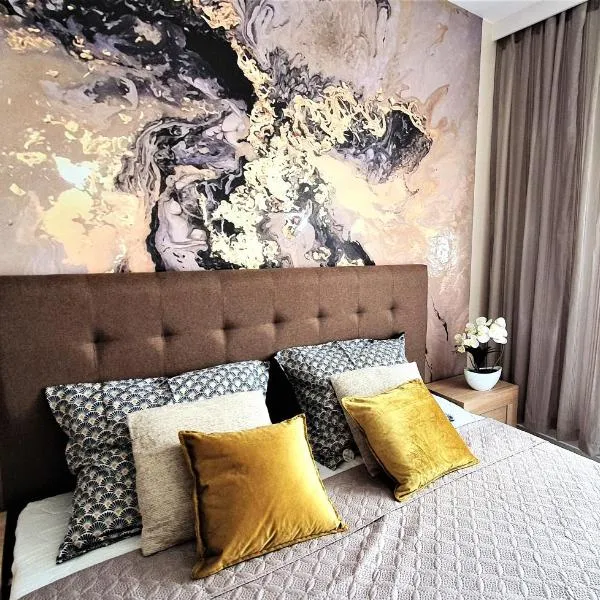 Apartament Przytulny przy Księżym Młynie- garaż- klimatyzacja, hotel v Lodži