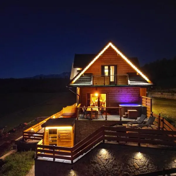 LK Mountain Residence segmenty z prywatnym jacuzzi i widokami na góry i jezioro, hotel in Falsztyn