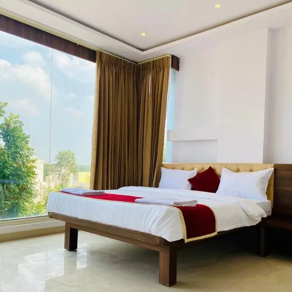 Tulips Inn Mysuru, hotel u gradu Misore