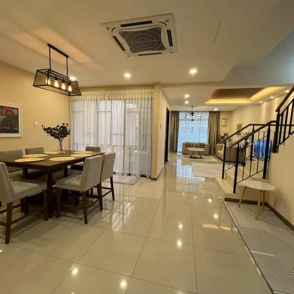 RUMAH SAUJANA KLIA by IMPIAN HOMESTAY, hotel v destinácii Sepang