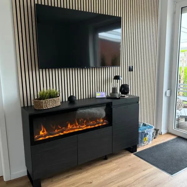 FeWo Krabbenbude - modern und fußläufig zum Strand, hotel em Dornum