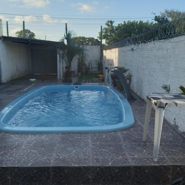 Casa com piscina pelo airb