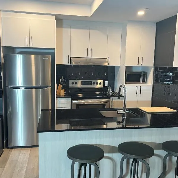 Joli condo en basse-ville - Parking gratuit 309357, hotel in Quebec City