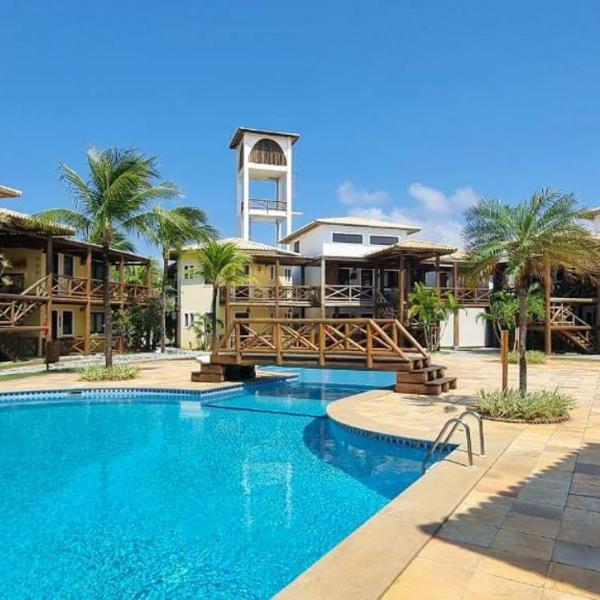 204 - Village aconchegante em frente a praia de Itacimirim