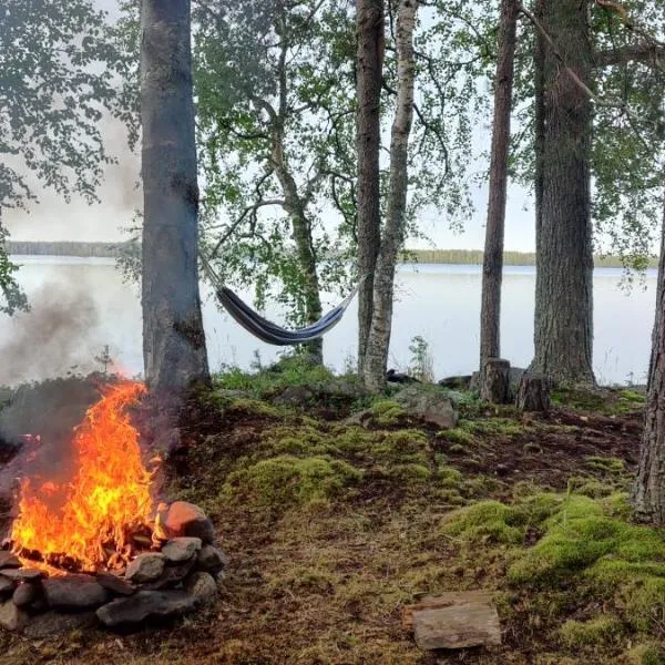 Traditional Finnish lakeside off-grid cabin, khách sạn ở Joensuu