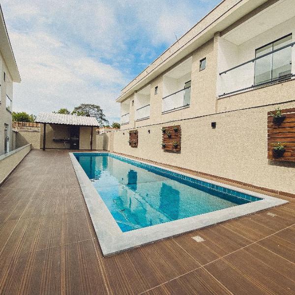 Casas Duplex todas com 3 suiítes ambas com ar condicionado, varanda, internet e churrasqueira privativa no Residencial Jardins de Taperpuã 2 codomínio a poucos metros da Praia de Taperapuã, com piscina e área gourmet. - Foto 4