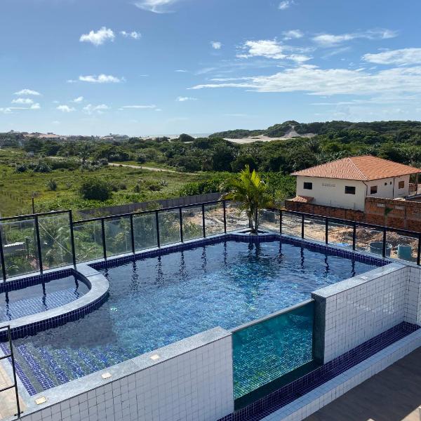 No Atalaia, Fort Poseidon rua do Atalho a 700 metros da praia do Atalaia, apartamento novo decorado, varanda, sala de estar e jantar, 02 suítes, 03 banheiros, lavanderia, cozinha, piscina, churrasqueira, salão de jogos, vista parcial das dunas e mar - Foto 4