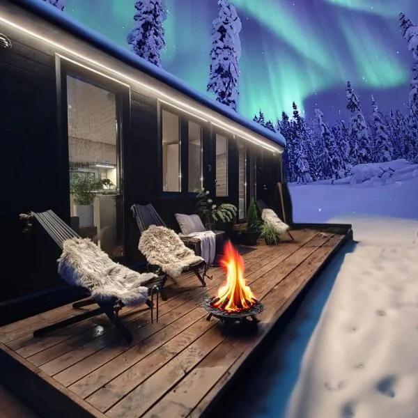 Lapland Riverside Cabin 4 HILLA , Ylläs, Tiny Home with Sauna, Fireplace, Terrace, BBQ, Wifi, Ski, Fishing, Pets OK, hotel en Äkäslompolo