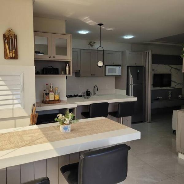 2 suítes novo, vista mar, alto padrão, piscina aquecida condominio