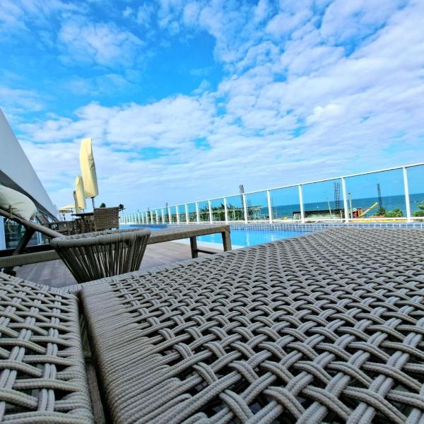 Flat aconchegante com piscina ampla