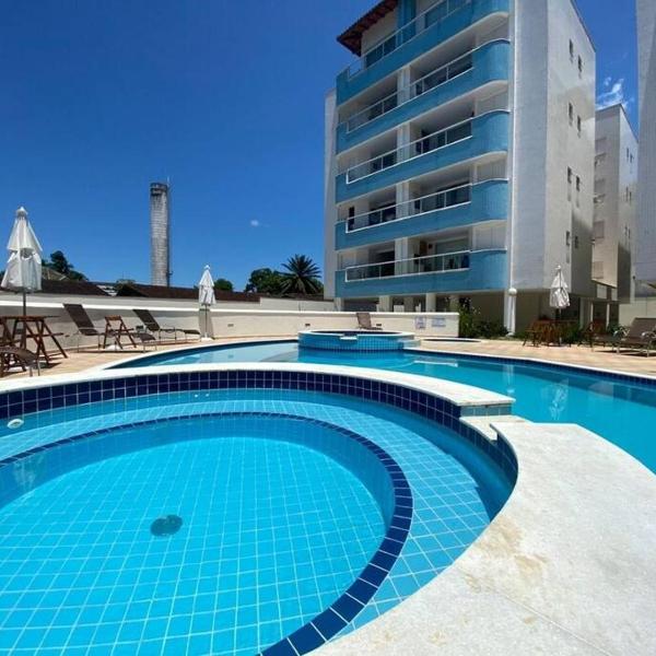 Apartamento 23A para 6 pessoas com Piscina e Churrasqueira no Cond Torremolinos Beach a 80m para Pé na areia na Praia da Enseada Ubatuba