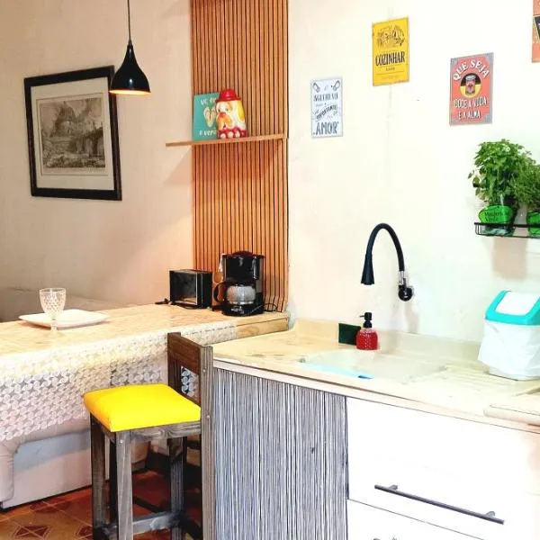 Casa aconchegante perto da praia，位于瓜鲁雅的酒店