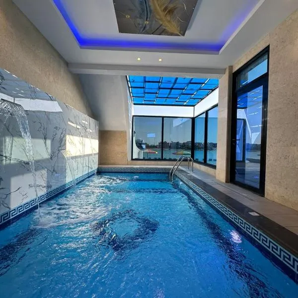 شاليه المالديف لافونتين دره العروس شاطى رملي مع مسبح خاص البرادايس للعائلات, hotel en Durat Alarous