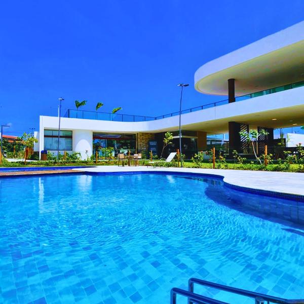 Flat em Muro Alto c/varanda,piscina e self checkin