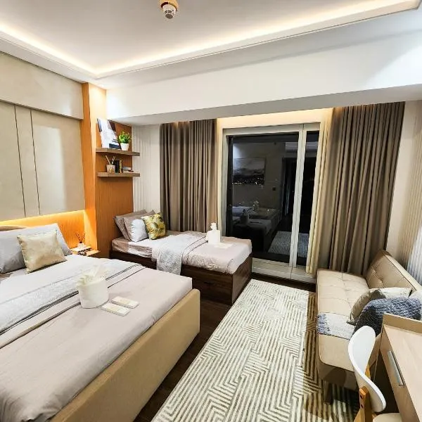 Viesnīca 1 Bedroom Apartment in Aeon Towers I City Views I Free Wi-fi, Gym and Pool pilsētā Davao
