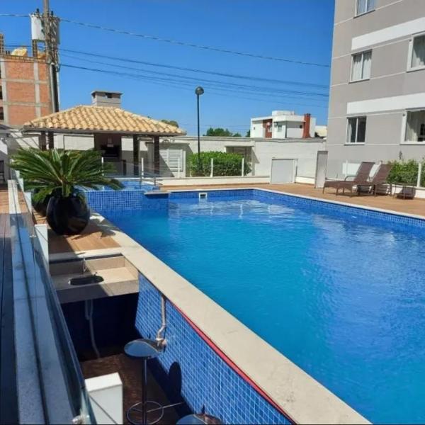 Easy Club 308 Apto 2 quartos Ar condicionado Wi-Fi Netflix Prime piscina Elevador Churrasqueira Sacada 200 m da praia Ideal para Famílias e Amigos Reserve agora
