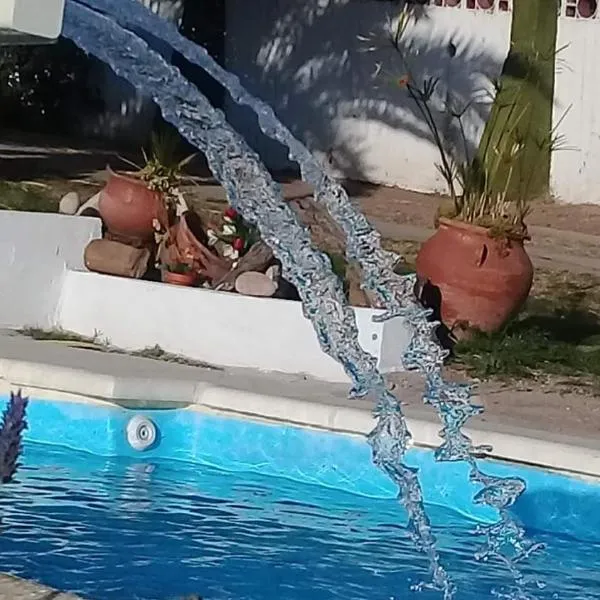 Casa y cabaña de Gachy, hotel i Villa Carlos Paz