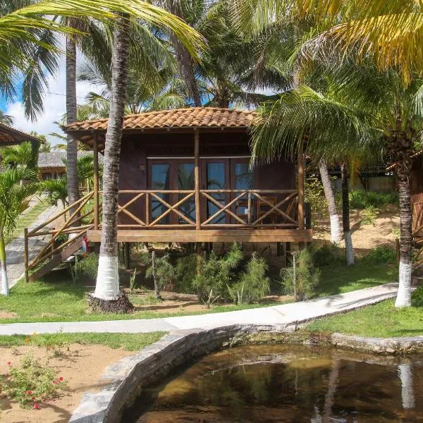 Pousada Palm Beach Praia de Caetanos Chalé Família, hotel en Amontada